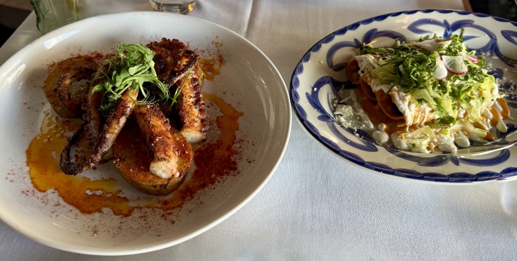 High-end Mexican tostada de atun, pulpo a las brasas (grilled octopus), and short rib flautas at Cantina La Veinte overlooking the Brickell waterfront in Miami, Florida